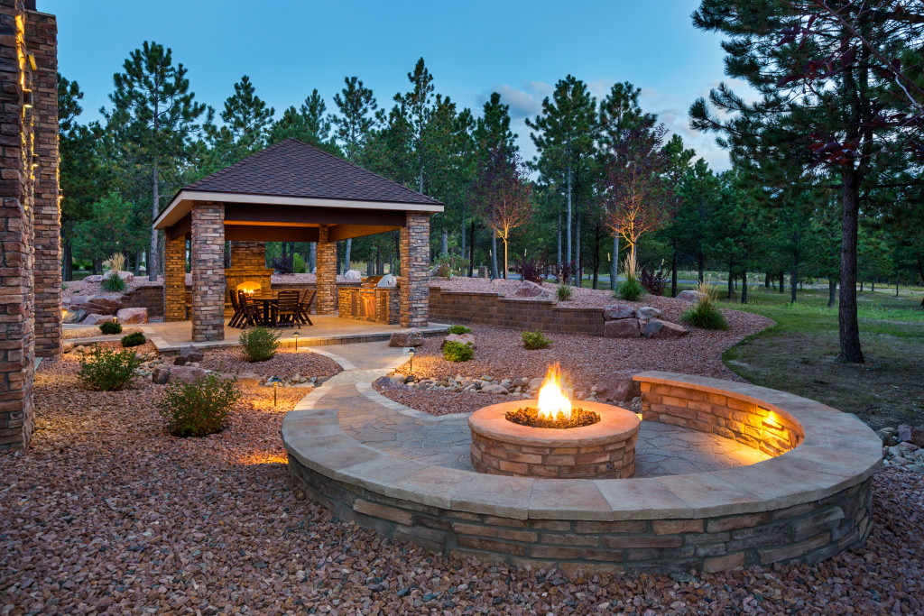 A fir pit near an outdoor living space