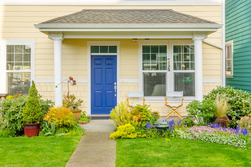 A home exterior with lots of greenery