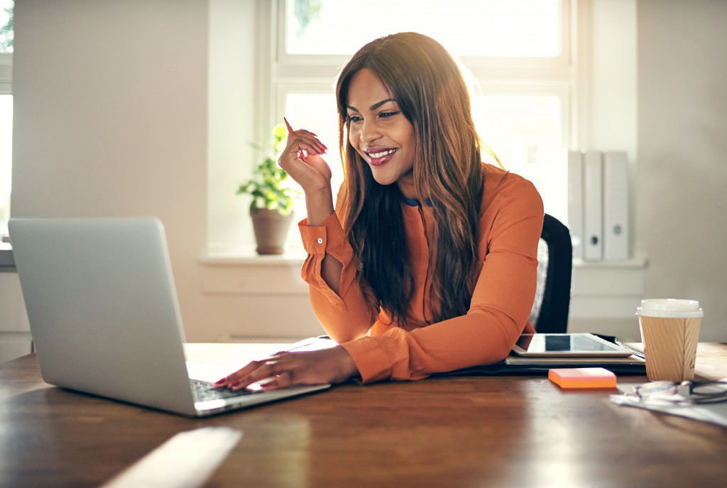 Home office with woman working